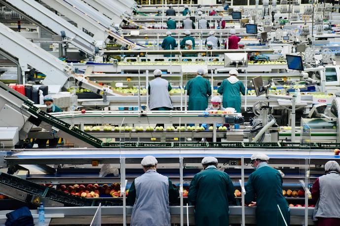 a group of men in a factory